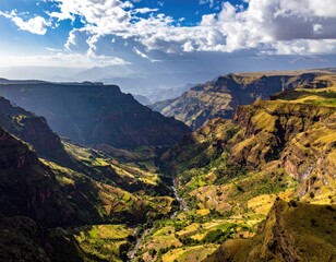 Obraz premium High-angle view of a dramatic valley, vibrant colors, and rugged mountains
