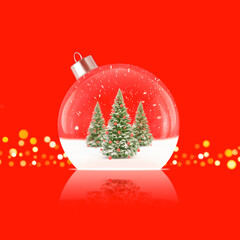 Christmas ball ornament with snowy trees inside on red background. Stock photo.