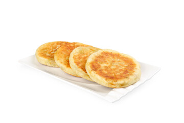 Traditional Pork-Filled Pastry Cakes on White Plate - Golden Brown Hand-Made Dumplings