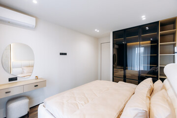 A Modern and Cozy Bedroom Featuring an Elegant and Inviting Design with Stunning Decor