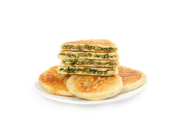 Stack of Flavorful Herbed Savory Pastries on White Plate - Traditional Baked Goods