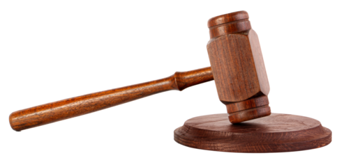 Wooden gavel resting on sound block for justice