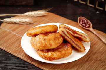 Deep Fried Red Bean Paste Cakes Traditional Asian Dessert on Wooden Board
