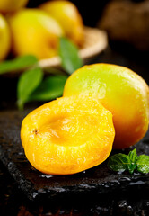 Fresh Ripe Apricots with Water Drops on Dark Slate - Natural Organic Fruit Food Photography