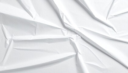 A high-angle, close-up shot of a crumpled white surface, possibly plastic or paper, showing deep creases and folds radiating from a central point, creating a textured abstract background