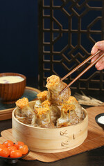 Handmade Cantonese Siu Mai Dumplings in Bamboo Steamer - Traditional Chinese Dim Sum Cuisine