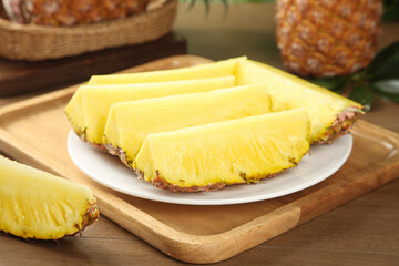 Golden Pineapple Slices with Diamond Flesh Pattern - Fresh Tropical Hainan Fruit on Wooden Board