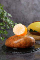 Fresh Persimmon Fruit Sliced Half Star Pattern Yellow Citrus Dark Slate Kitchen Food Photography