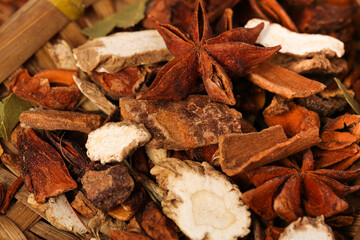 Aromatic Spice Collection with Star Anise and Cinnamon Sticks on Wooden Background