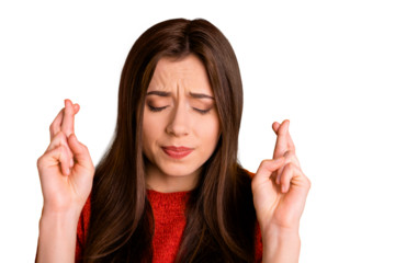 Close up photo of terrified frightened youngster with fingers crossed hoping for luck with desparate face expression isolated over vibrant color background