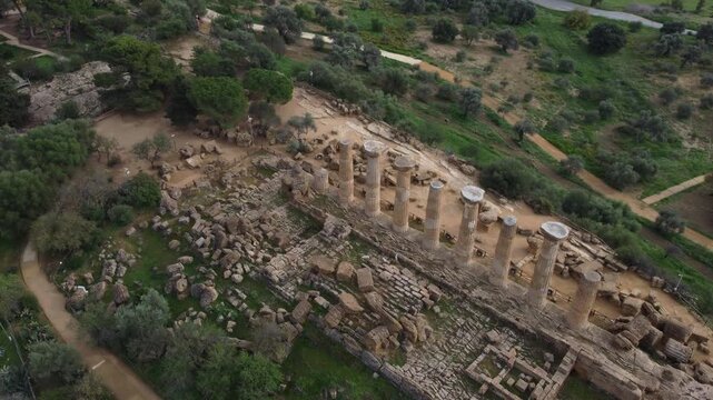 Drone footage of Valle dei Templi in Agrigento, Sicily, highlighting the Temple of Concordia, Temple of Juno, Temple of Heracles, Temple of Olympian Zeus, and Castor and Pollux.