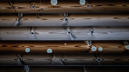 Weathered Wood Planks with Knots and Decorative Spheres in Horiz
