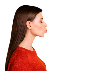 Photo of white trendy fascinating young beloved millennial girl kissing empty space with eyes...