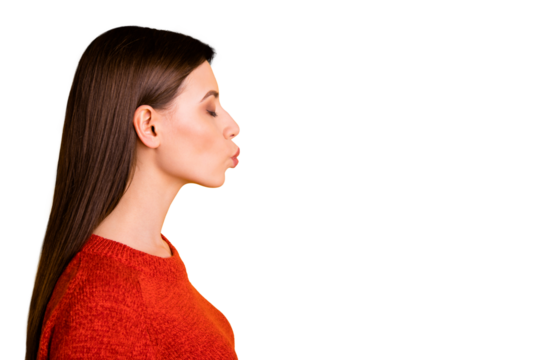 Photo of white trendy fascinating young beloved millennial girl kissing empty space with eyes closed lips pouted isolated over yellow vibrant color background