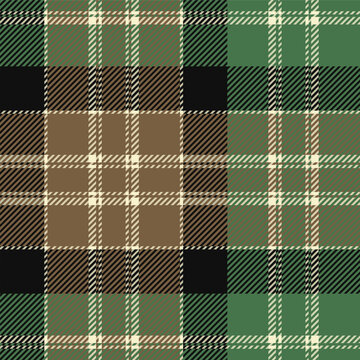 Green and brown tartan plaid. Scottish pattern fabric swatch close-up. 