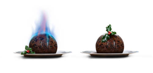 A collection of two level view traditional Christmas puddings with and without blue flames from lit brandy on a round plate with a sprigs of holly, berries isolated against a transparent background