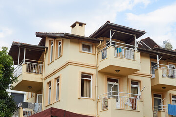 Residential building apartment. Modern real estate, low rise building in the tourist town of Antalya province in Turkey