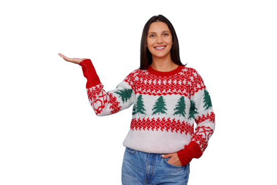 Happy young woman wearing festive christmas sweater presenting product on open palm with transparent background - Powered by Adobe