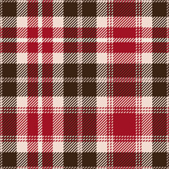 Red and brown tartan plaid. Scottish pattern fabric swatch close-up. 