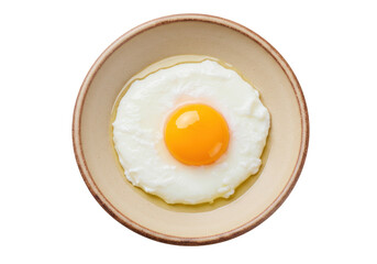 Sunny side up fried egg isolated on a plate, breakfast food item for cooking and recipe design