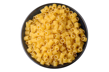 Top view of uncooked Ditali pasta in black plate on white background