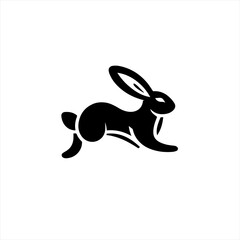 Stylized black rabbit silhouette in a dynamic running pose