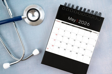 May 2026 calendar and stethoscope, Medical appointment schedule to check up concept.