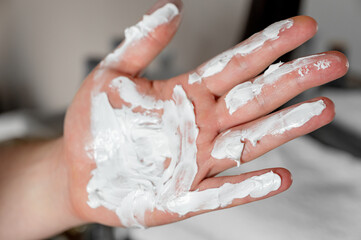 Male Hand with Skincare Cream