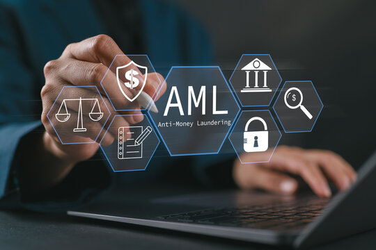 AML : Anti money laundering financial bank concept. businesswoman use laptop with virtual AML icon for anti money laundering regulations.