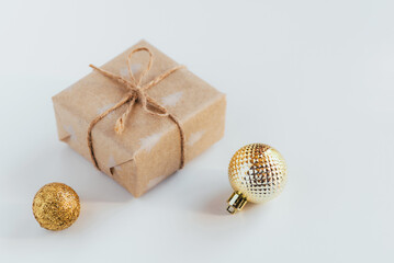 Christmas gift box and decorations on white background