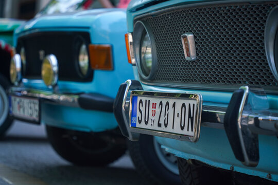 Close-up of two classic light blue Zastava 101 (Stojadin, Skala, Yugo) cars parked side-by-side, showcasing retro design and Yugoslavian automotive heritage. Subotica, Serbia, 07 June 2025