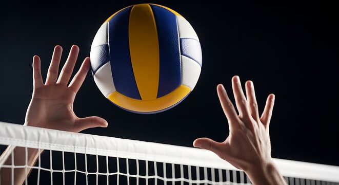 Volleyball player hands in action at the net ready to block the ball during a competitive game with a dark background
