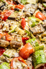 Baked vegetables with cheese and herbs