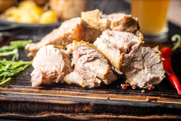 Juicy roasted pork with spices and beer