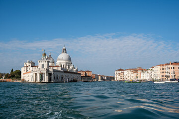 View of the Basilica of Santa Maria della Salute and the entrance to the Grand Canal in Venice, Italy.