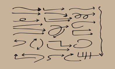 Collection of hand drawn arrows and symbols on textured background