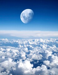 Fototapeta premium A vast expanse of clouds beneath a luminous moon