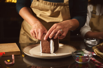 Person Decorating Cake With White Icing In Cozy Home Kitchen - Holiday Bakery Scene