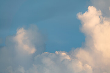 White fluffy cumulus clouds podium on blue sky with empty space background.Beauty cosmetic product placement pedestal present promotion minimal stand display,dreamy concept.