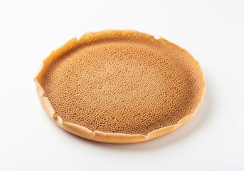 A single, thin injera bread with its characteristic porous surface texture and slightly curled edges, ready for serving. Isolated white background.