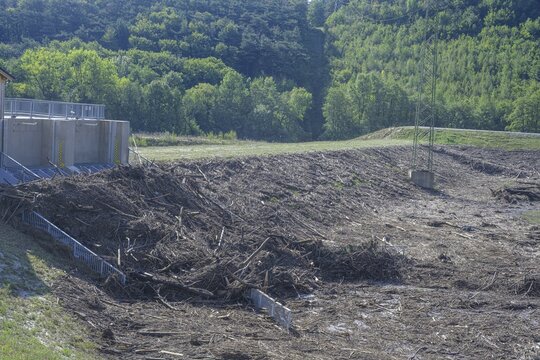Blockages caused by wood at the Fahrafeld flood defence after a severe storm, Pottenstein, Lower Austria, Austria