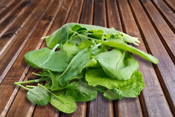 Pile of fresh green baby spinach leaves