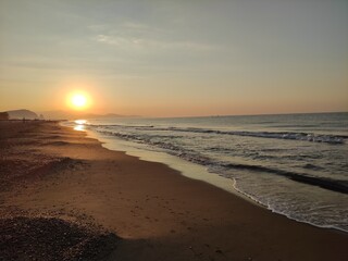 sunset on the beach, traveling Greece, Italy 