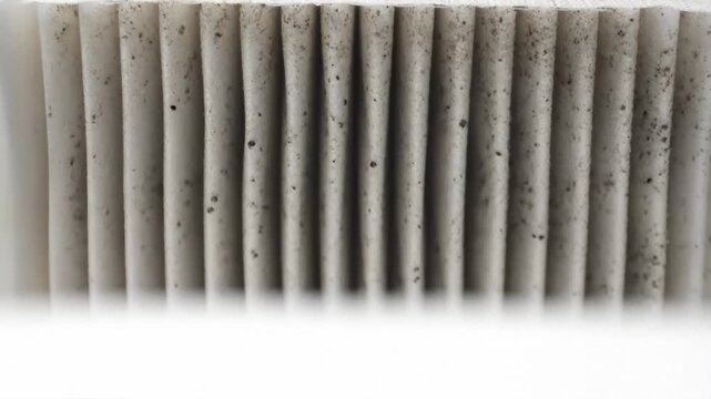 Extremely dirty filter element with accumulated dust and microscopic particles