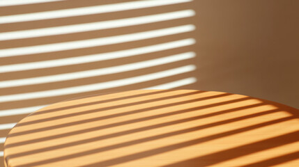 Light and Shadow, Sunlight streaming through blinds creates striped patterns on a table surface, enhancing the ambiance of a serene indoor space.