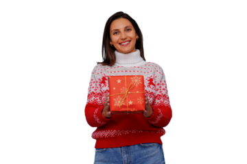 Woman in cozy christmas sweater holding a festive gift, smiling happily, celebrating holiday spirit, transparent background
