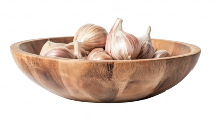 A beautifully crafted wooden bowl filled with fresh garlic cloves. highlighting the natural textures of the wood and garlic. perfect for culinary themes or food-related projects