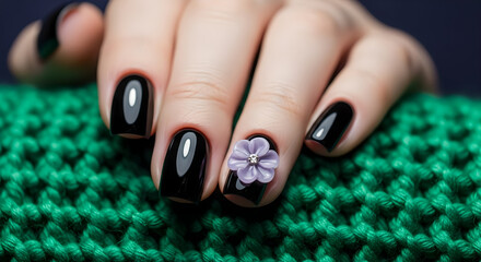 Woman Hand Manicure Black Nails Purple Flower Green Fabric