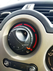 Car dashboard control for heater settings in a vehicle