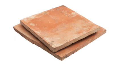 Two rustic terracotta tiles stacked on a white background. their earthy texture and natural color variations. ideal for design and home improvement projects